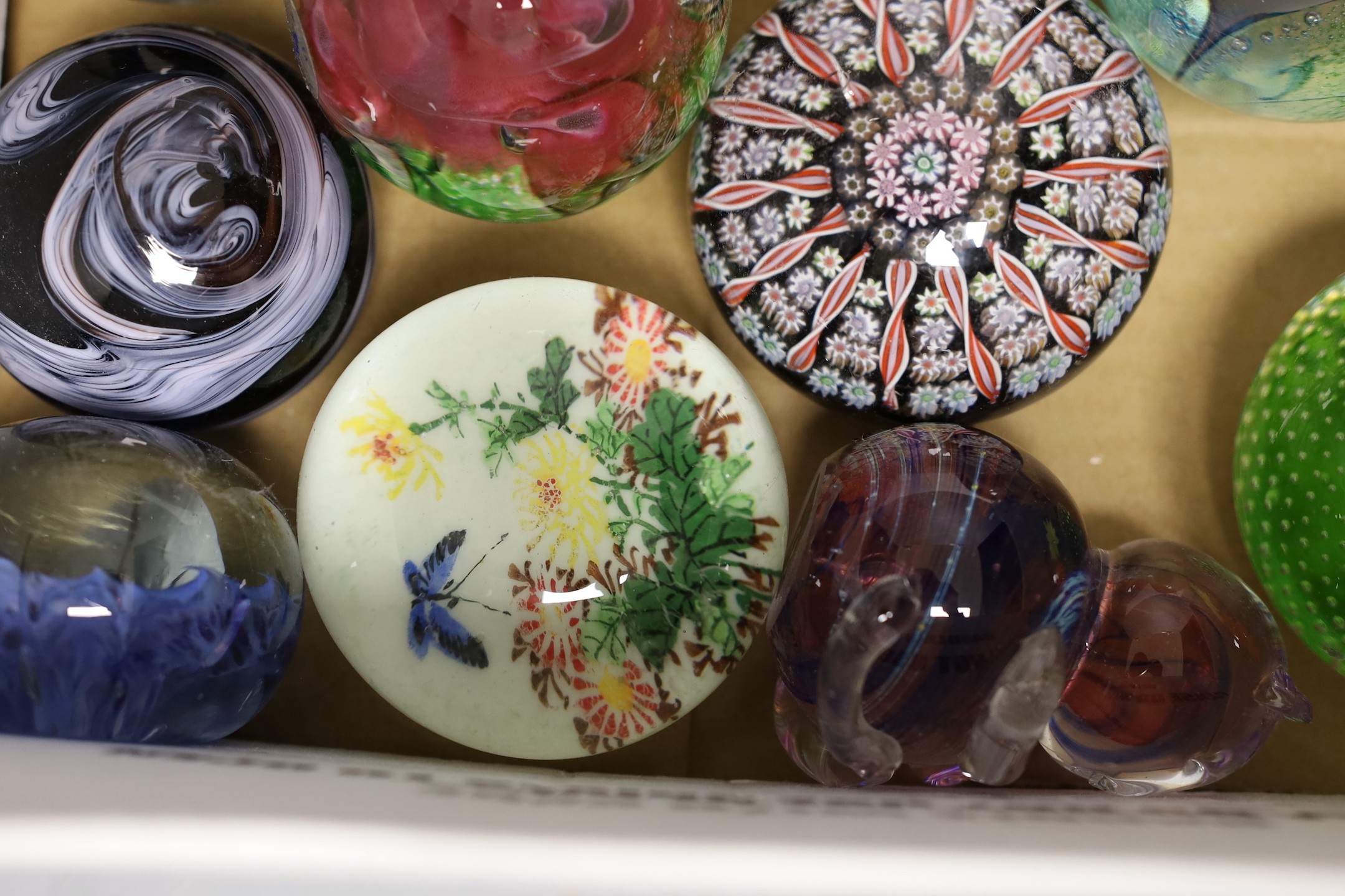 Fourteen various glass paperweights